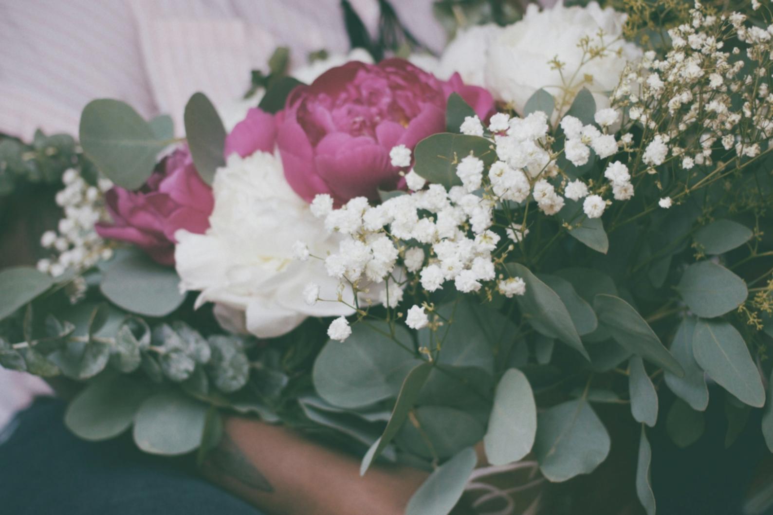 Expert demonstrating creative floral arrangement techniques